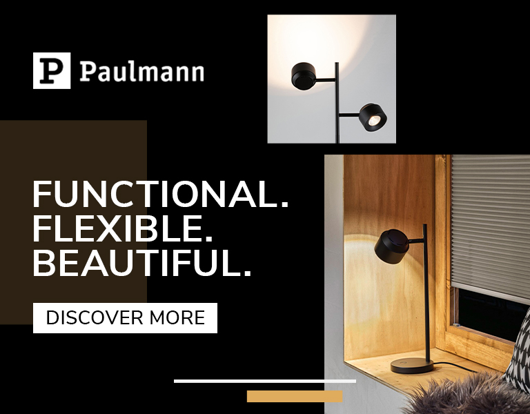 Discover more Modern black table lamp and adjustable wall light by Paulmann, presented in a cozy wooden interior setting.